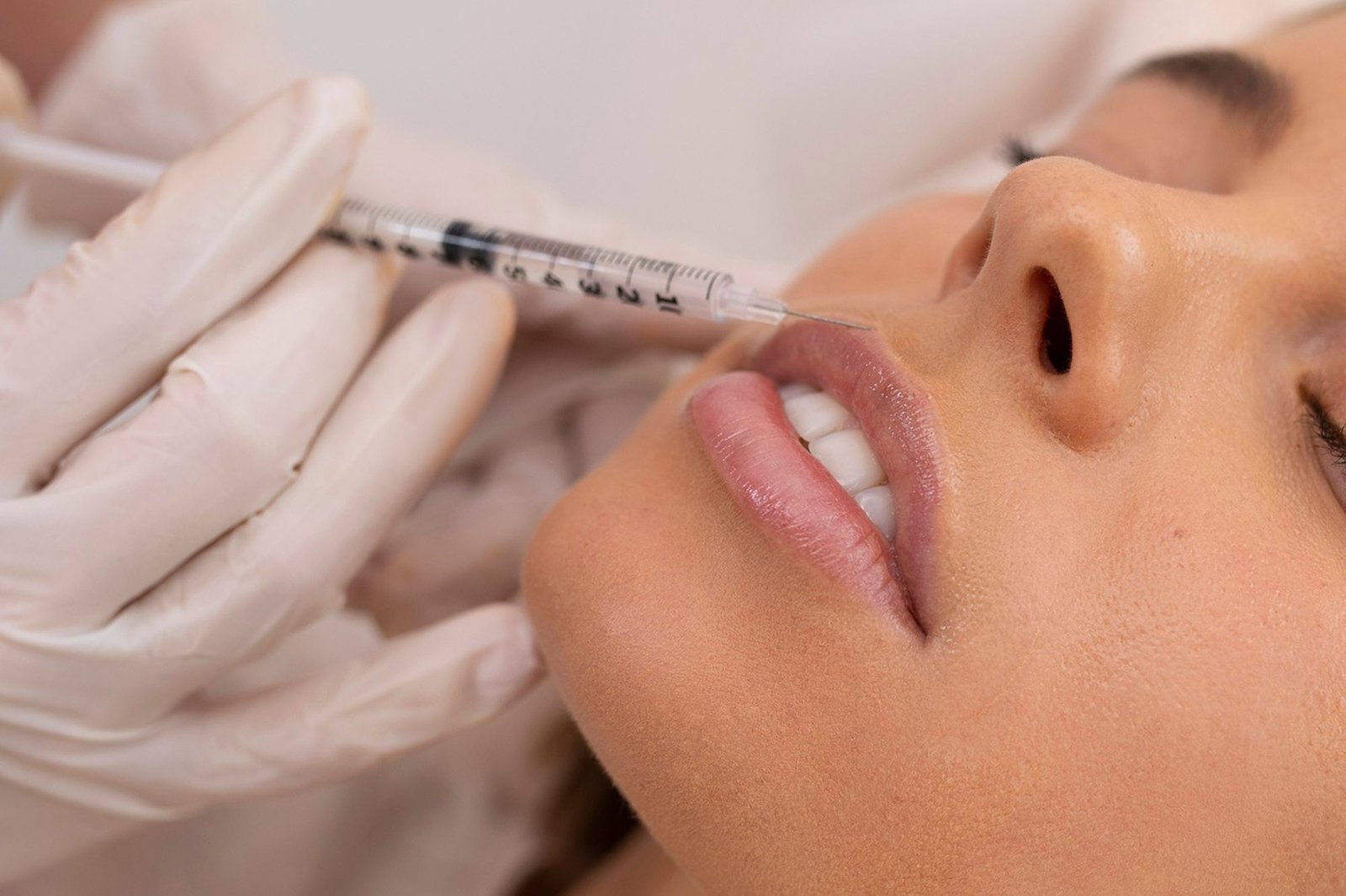 Charlotte injector performing Juvéderm Volbella treatment